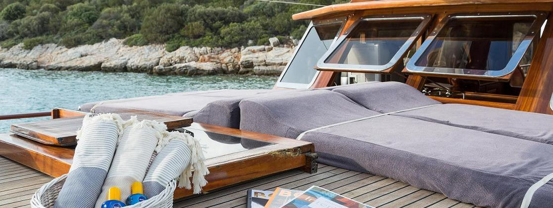 Primadonna gulet foredeck sun-lounger area with panoramic sea view