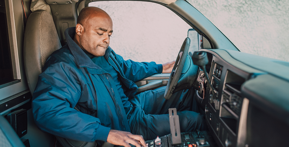 Truck driver sitting in truck