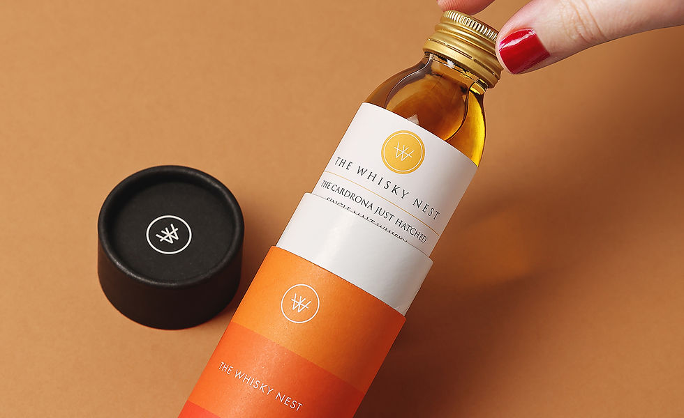 A lady removing a 100ml bottle from our new Journey Tube