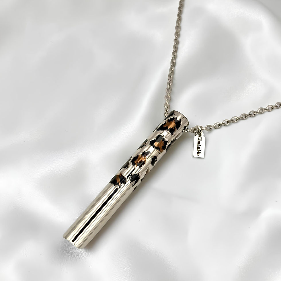 Thumbnail: anxiety necklace-silver with animal print on white satin background