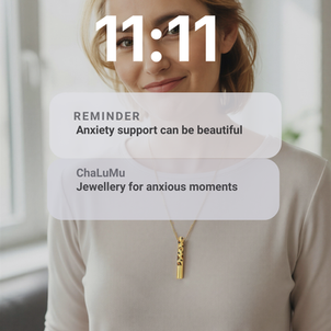 Model wearing ChaLuMu Savannah Anxiety Necklace, gold with leopard print. Image appears to be a screensaver, reminder-anxiety support can be beautiful.