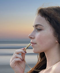 woman showing how to use chalumu breathing necklace