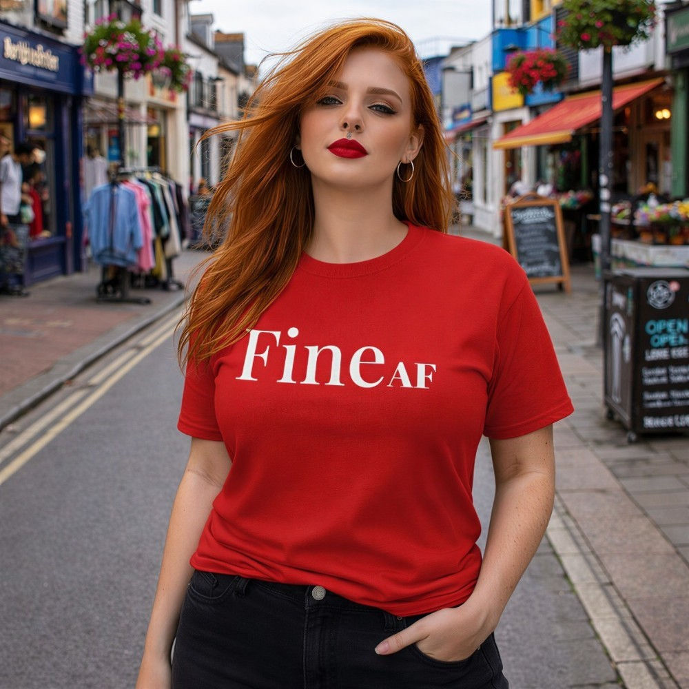 Model wearing red Tee with white text -Fine AF' background is Brighton North Laines