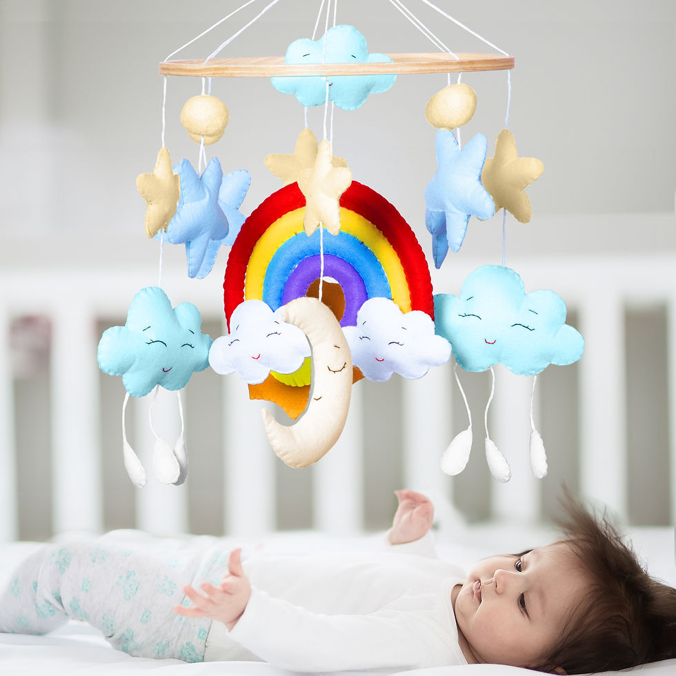 Rainbow theme mobile cot