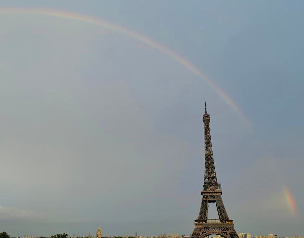 Glimpse of rainbow over the Eiffel Tower