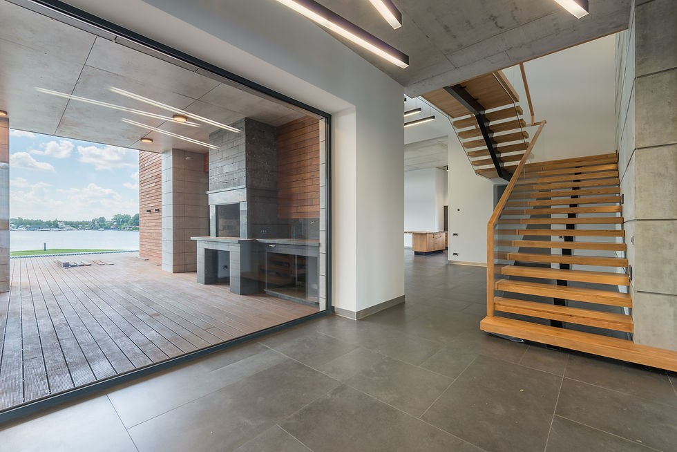 A spacious home with an open stair and terrace