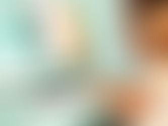 A young girl playing piano in a group piano class at Tuneful Journey.