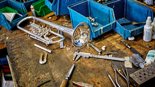 workbench-of-an-instrument-maker-with-tools-and-trumpet-DIKF000200 (1)_edited.jpg