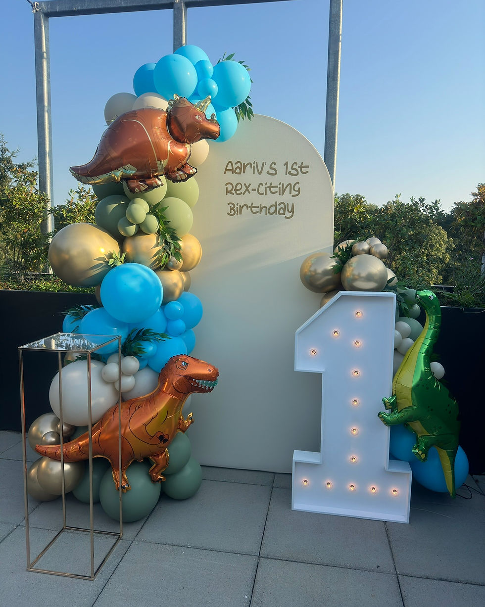 First birthday balloon arch dinosaur theme