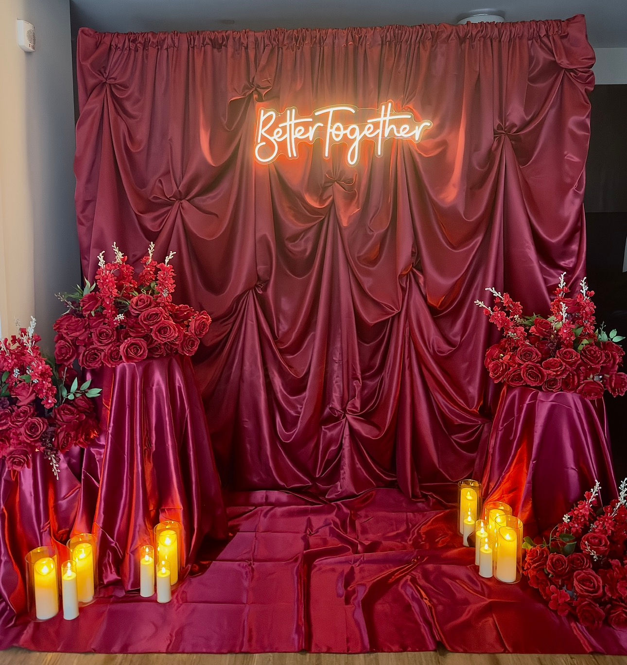 Burgundy draping backdrop