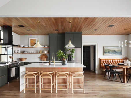 Handmade counter stools from Indonesia add character to a modern kitchen.