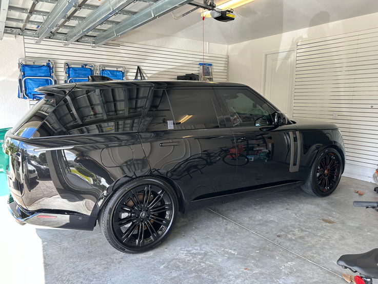 Black Range Rover in garage