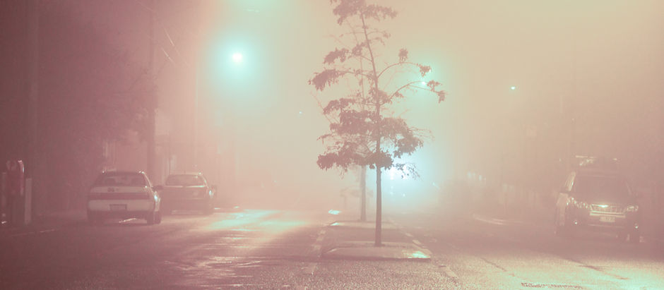 Winter fog and empty streets at night make a haunting combination
