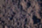 Thumbnail: A full frame of Cedar Grove Organic Compost to show the texture of the black soil amendment