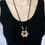 Thumbnail: Beautiful Gold Metal Flower Leather Cord statement Necklace