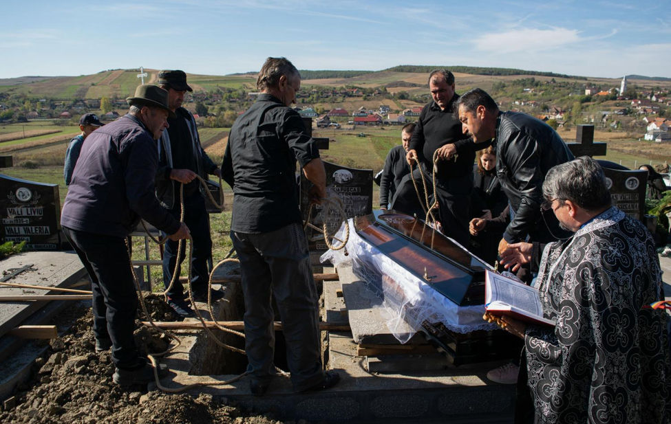 Documentary photograph of a burial service in Romania.