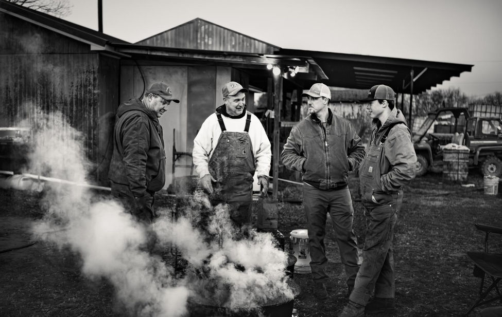 Documentary photograph from a traditional hog killing in North Carolina.