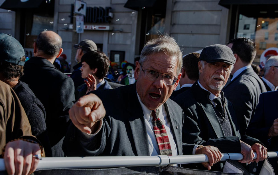 Documentary photograph of a man at an anti-abortion protest in Boston, MA.