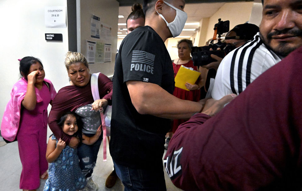 Documentary photograph of ICE deporting people in New York City.
