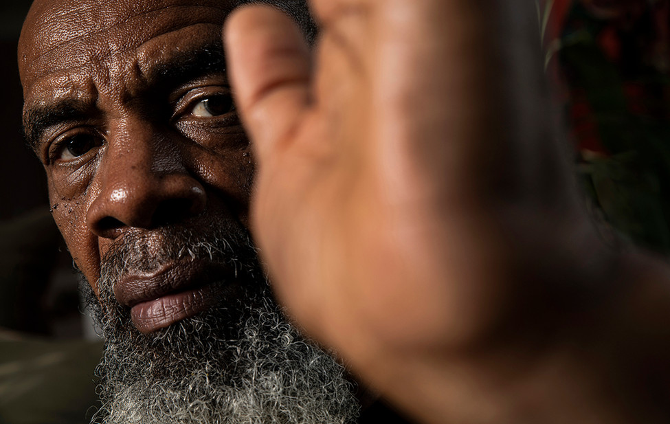 Portrait of a college professor discussing the affects of COVID-19. 