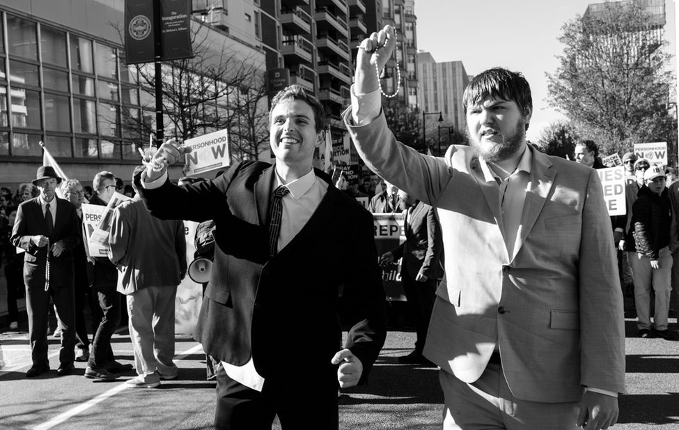 Men at a pro-choice protest in Boston, MA by photographer Edward Boches.