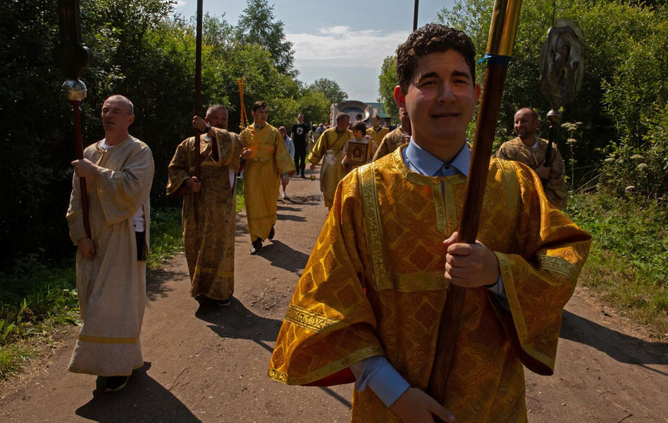 Documentary photograph of a Russian Orthodox procession.