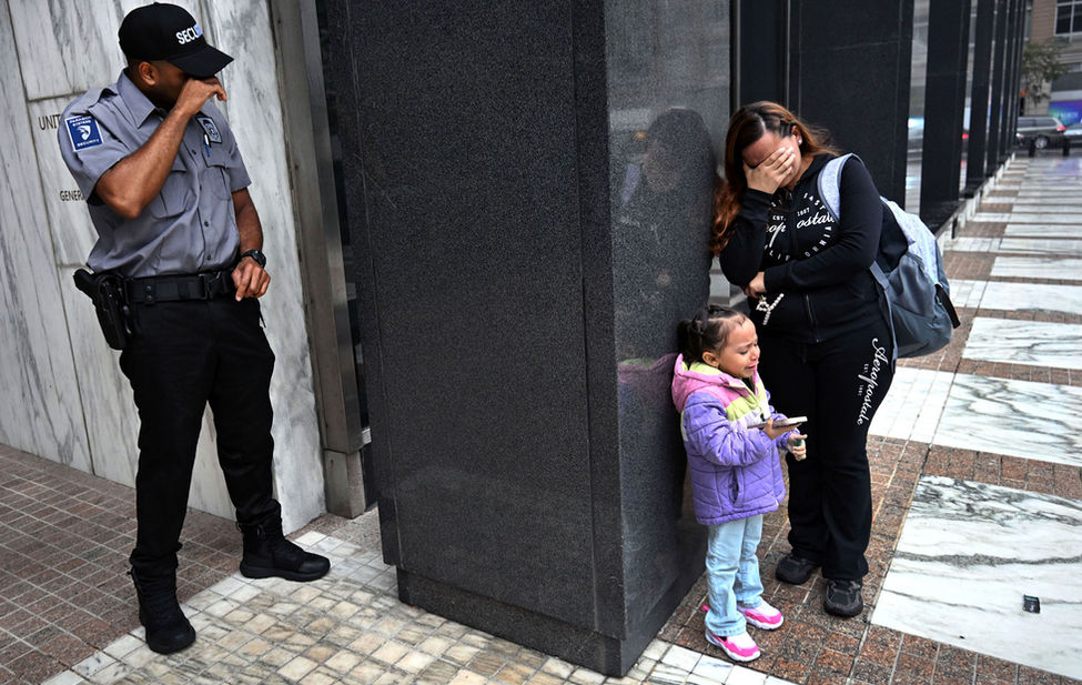 Documentary photograph of ICE deporting people in New York City.