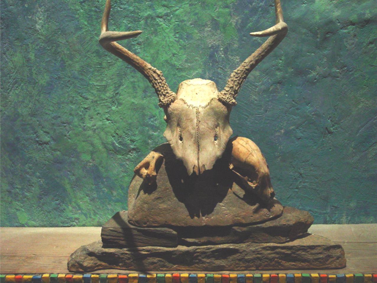 Skull beneath cross