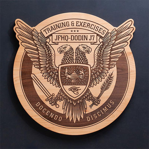 High detailed laser engraved office lobby sign on raw alder wood with custom shape.