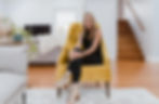 Julie Evans from Julie Evans Design sitting in an interior design clients home