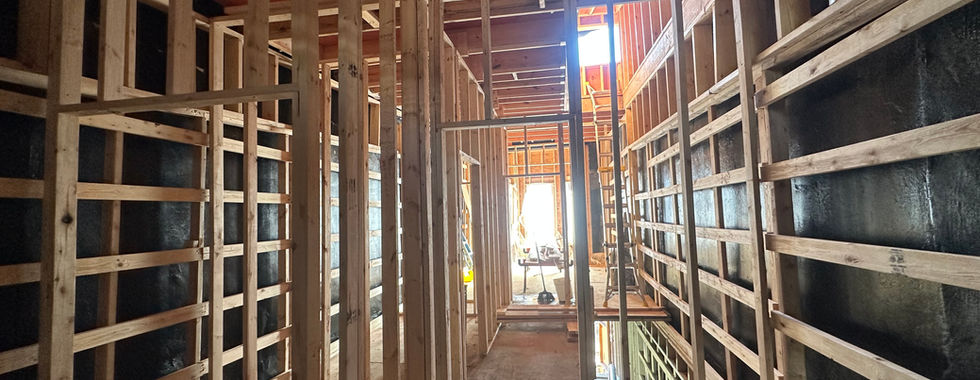 Passive house certified row home construction interior with framed in wood studs and wood flooring