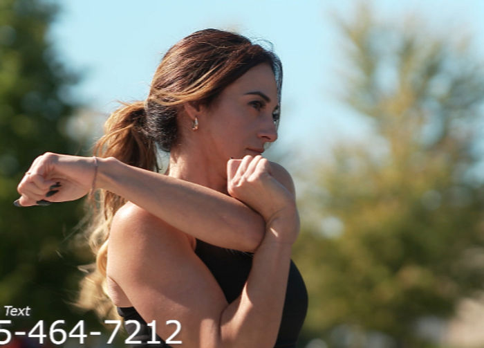 woman stretching to run after getting stem cell therapy for her back pain