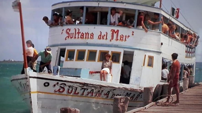 How do Isla Mujeres property buyers find the island.