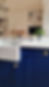 Tuxedo Blue kitchen cabinets — workshop spray finish with consistent sheen, Cardiff