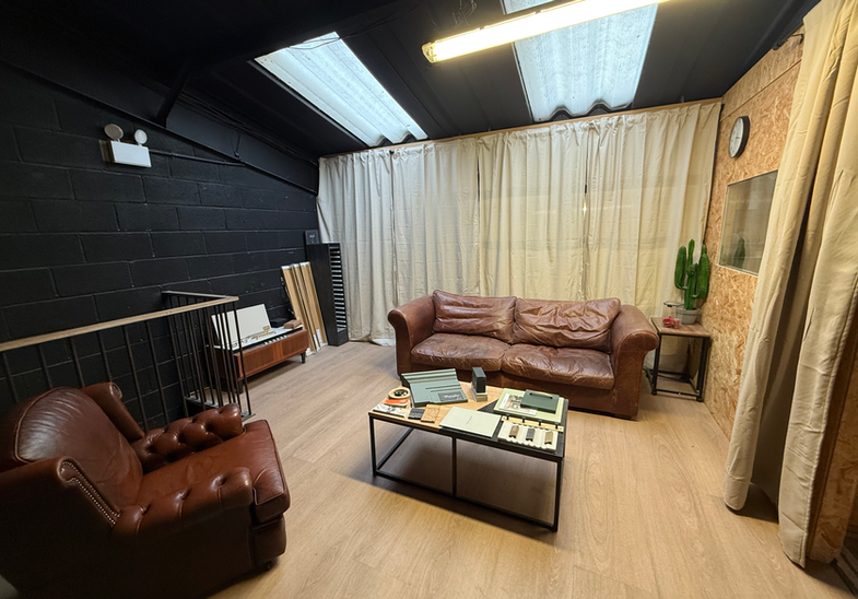 Interior studio space with seating area used for client meetings and colour consultations