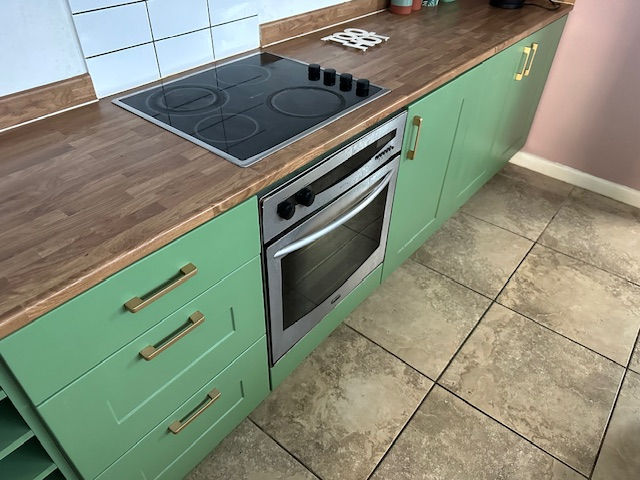 Previously sprayed kitchen - from another Cardiff company