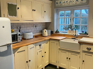 Bespoke wooden kitchen in dated cream - before refinishing