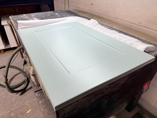Spray finish on kitchen cabinet door