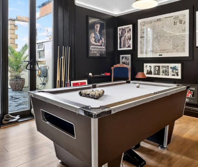 Custom spray finish on pool table refinishing project in South Wales