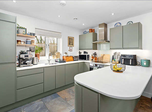 Farrow & Ball Treron on this kitchen refinishing project - sprayed by Bespoke Spray Studio