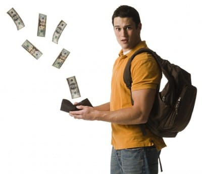 Kid with money flying away from his hands