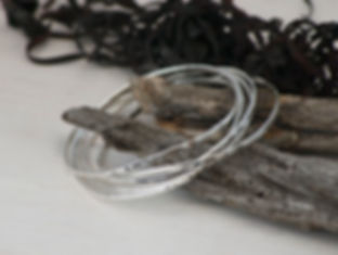 Five Sterling Silver Entwined Bangles
