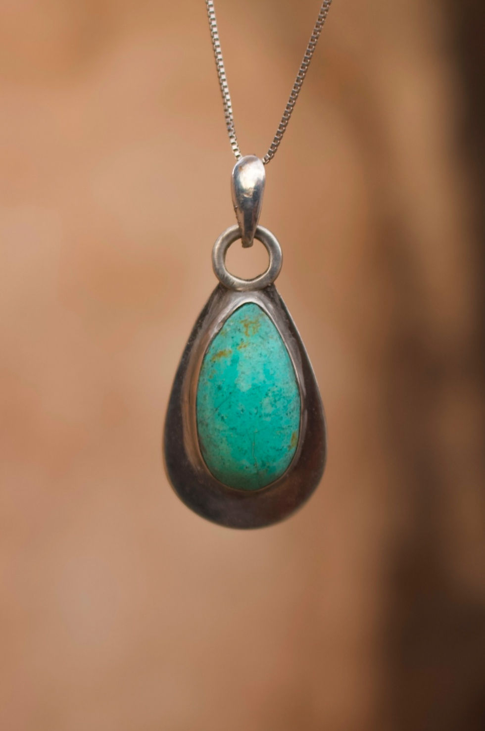 Turquoise handmade pendant ethically sourced jewelry made by Julia Simpson J Signe Jewelry