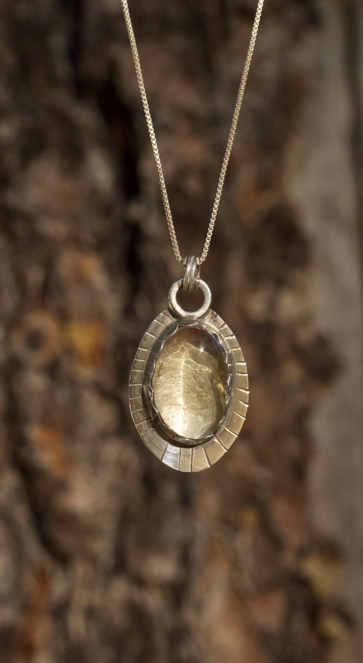 Oregon Sunstone Pendant mined by Julia Simpson at Spectrum Sunstone Mine.