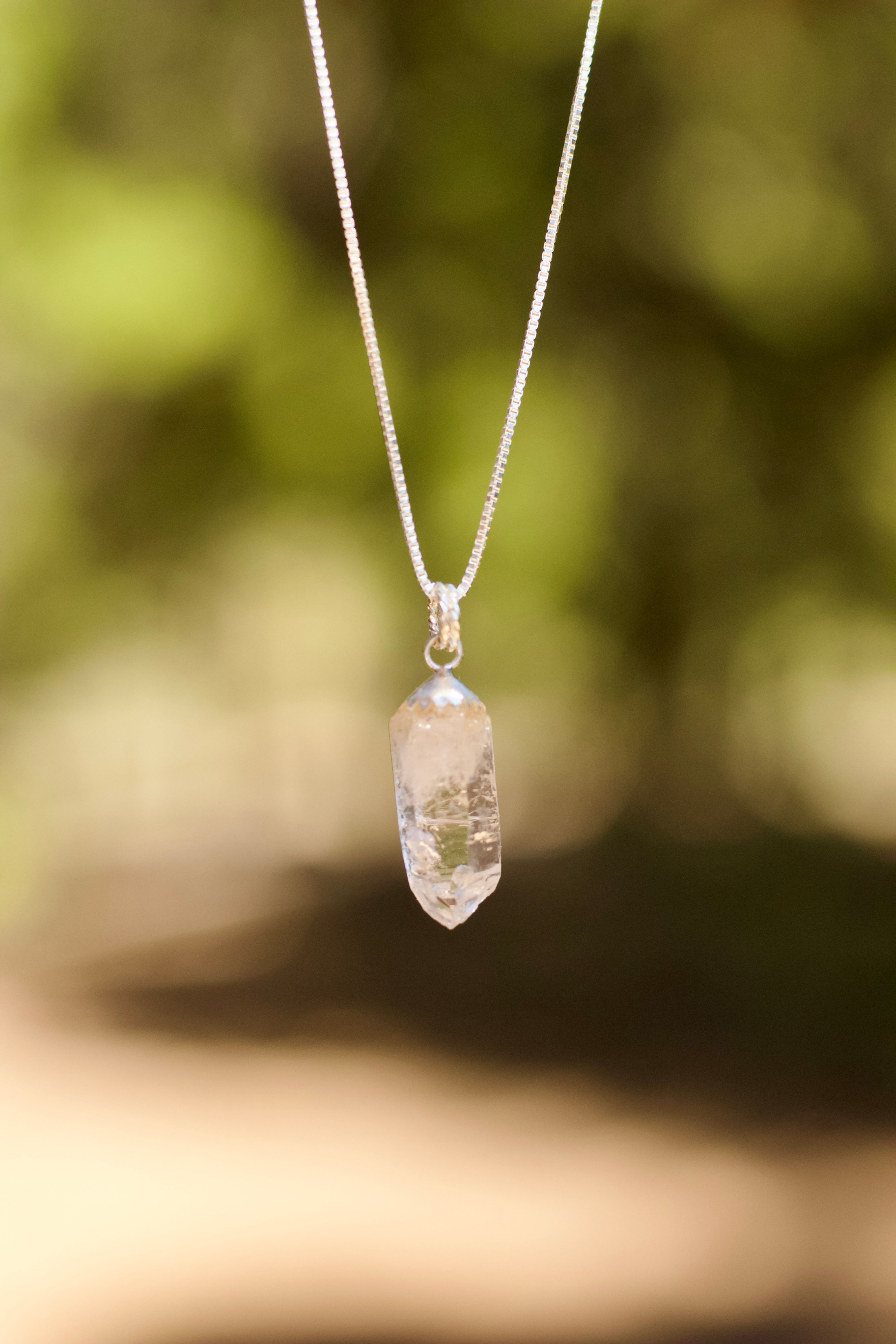 Colorado Clear Quartz Crystal Pendant handmade by Julia Simpson through J. Signe Jewelry