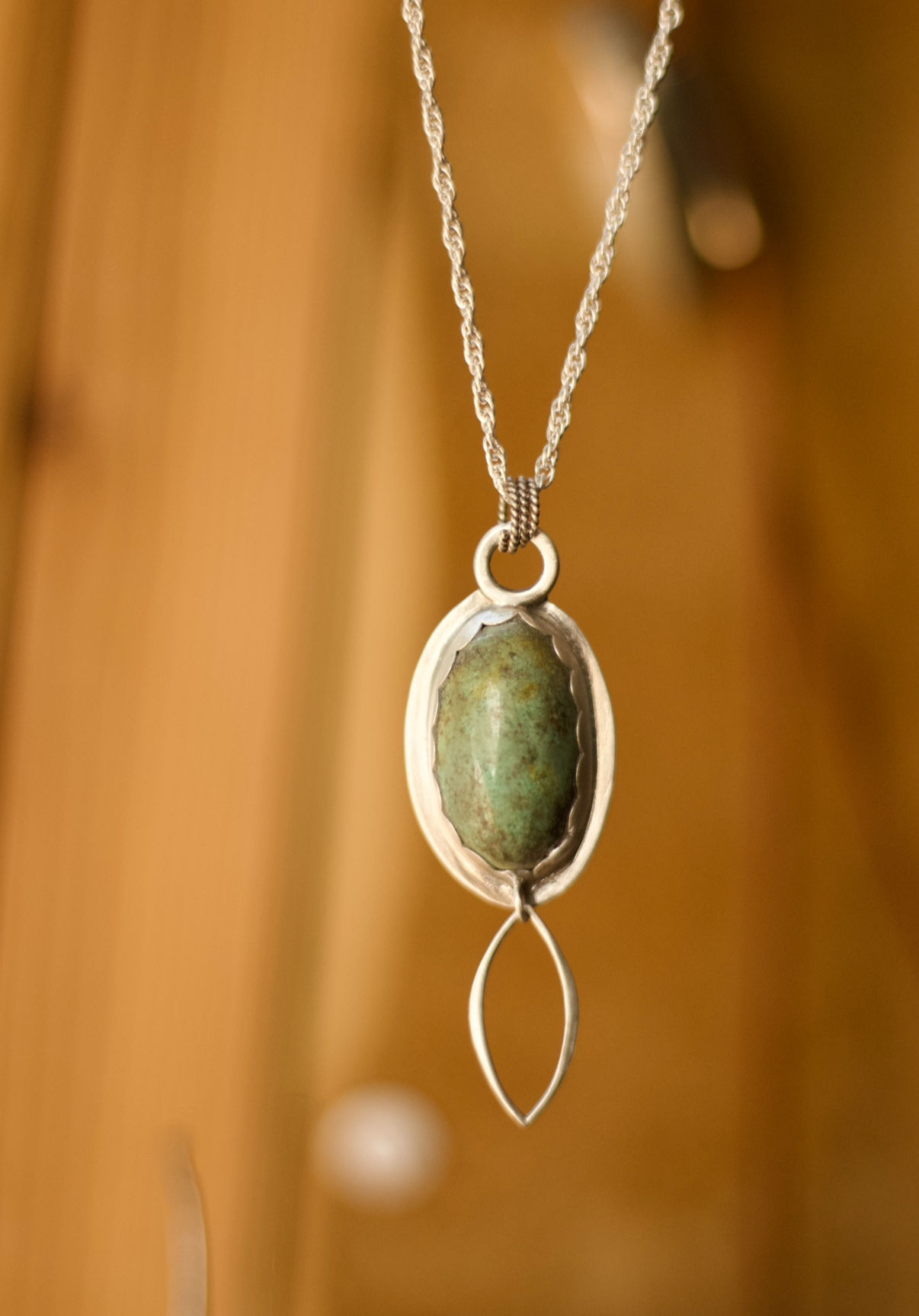 Chrysocolla Pendant set in sterling silver made by Julia Simpson through J.  Signe Jewelry