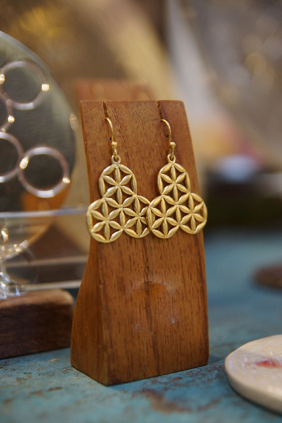 Miniature : boucle d'oreille graine de vie laiton