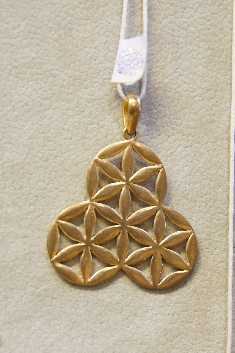 Miniature : boucle d'oreille triple graine de vie laiton