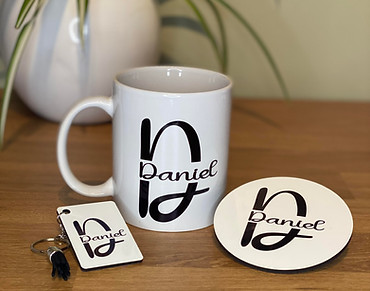 Bespoke mug set featuring a mug, coaster and keyring with a name design.