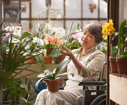 Woman in greenhouse